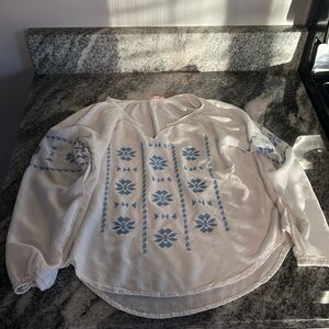 I am selling a long sleeve dress shirt it size medium in kids